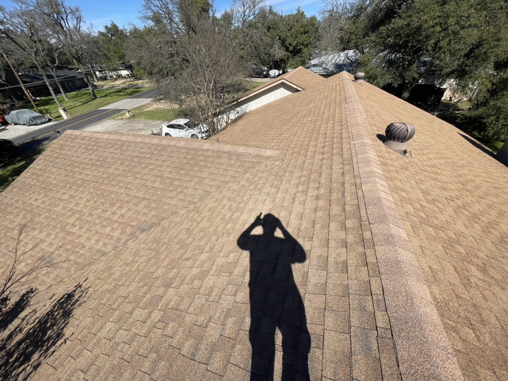 Before storm damaged roof replacement in Austin Texas